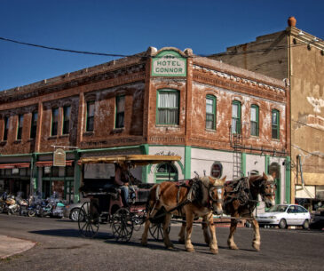 connor hotel in jerome az with a horse drawn buggy on main street in 2004
